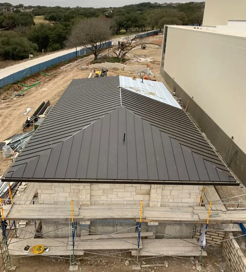 Metal roof new construction with scaffolding in Cullman